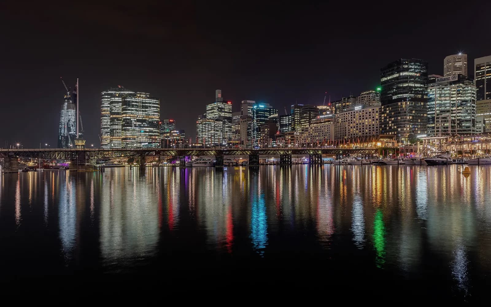 Darling Harbour and the Sydney skyline reflected in the water at night